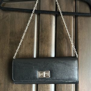 Also baguette style clutch bag with silver chain